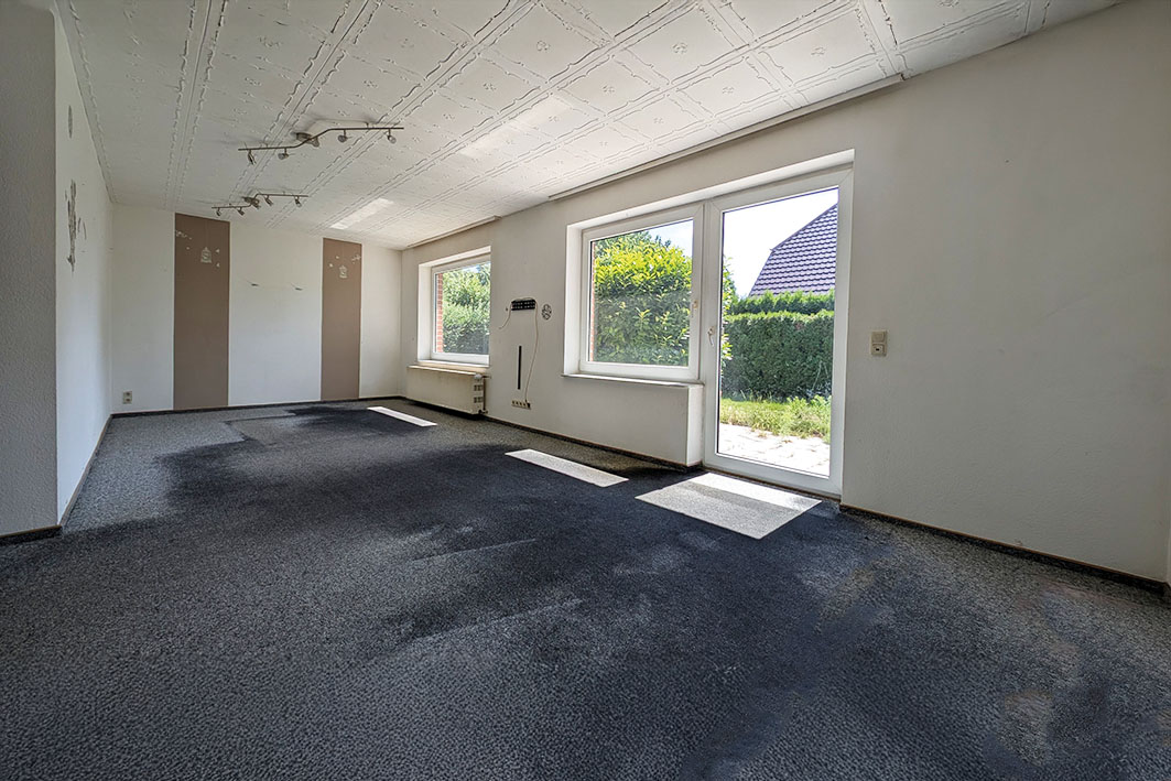 Wohnzimmer mit Zugang zur Terrasse